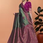 💛🌿 Emerald Plum Banarasi Silk Saree with Floral Zari Accents ✨🌸